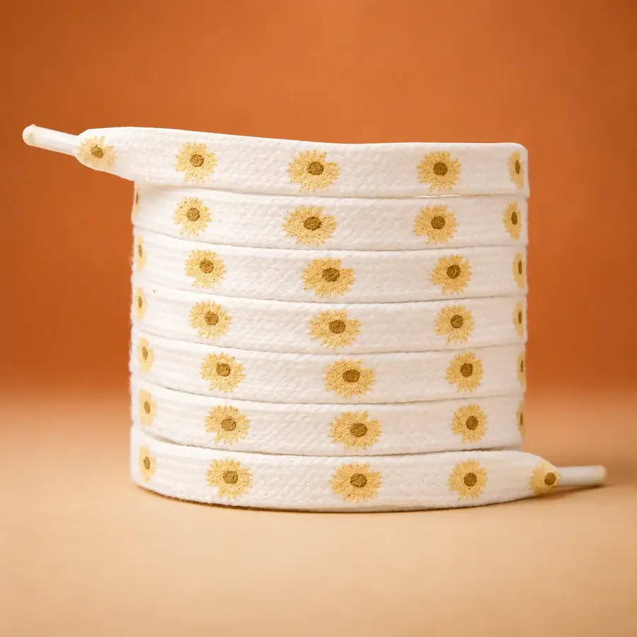 White flat shoelace with gold floral print